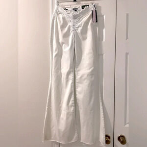 Wild Fable 0 NWT white flare leg UNIQUE pale blue stitching, raw waist & hem.